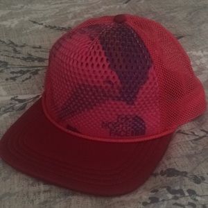 Red north face trucker hat